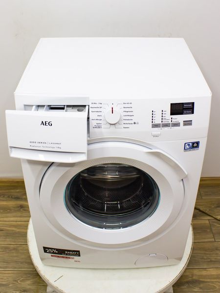 Стиральная машина AEG L6FBA484 000031285 фото