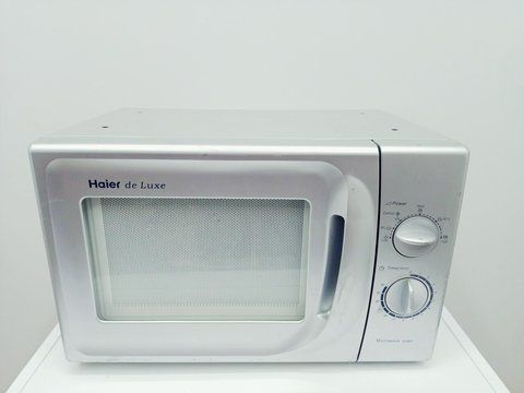 Мікрохвильова піч Haier HR 6752TH 1250w sn GB06D0E0200GC5AJ0603 000040989 фото