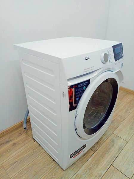 Стирально сушильная машина 2в1 AEG 7000 Series Kombi L7WB65684 000042919 фото