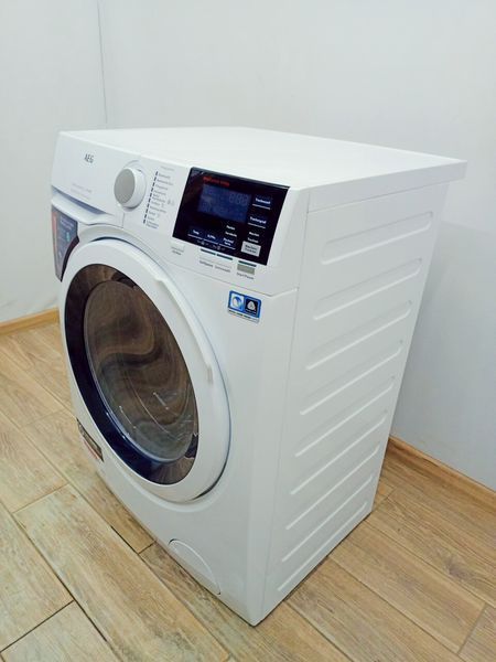 Стирально сушильная машина 2в1 AEG 7000 Series Kombi L7WB65684 000042919 фото