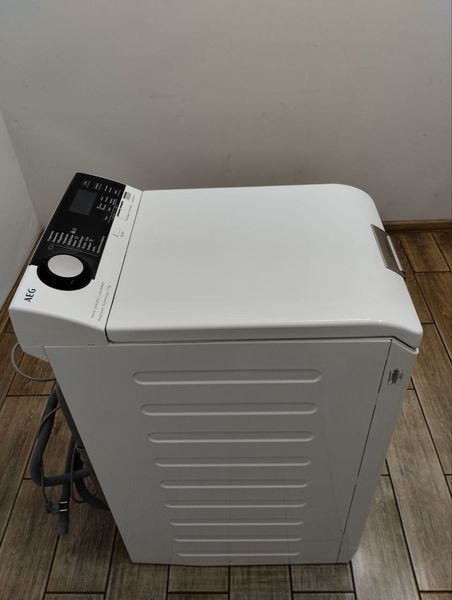 Стиральная машина вертикальная AEG L7TL710EX 7 кг 2200w sn 94500030 000047121 фото