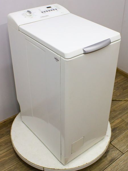 Стиральная машина вертикальная Electrolux EWT1025 000031378 фото