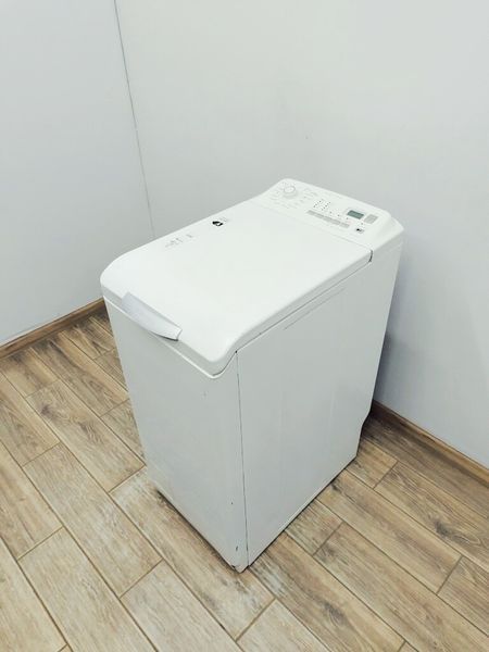 Стиральная машина вертикальная Electrolux EWT10420W 000037132 фото