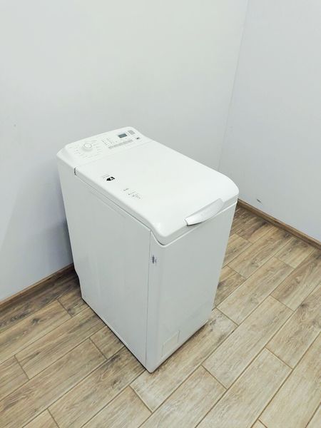 Стиральная машина вертикальная Electrolux EWT10420W 000037132 фото
