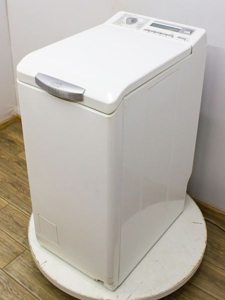 Стиральная машина вертикальная AEG L47239 000031352 фото