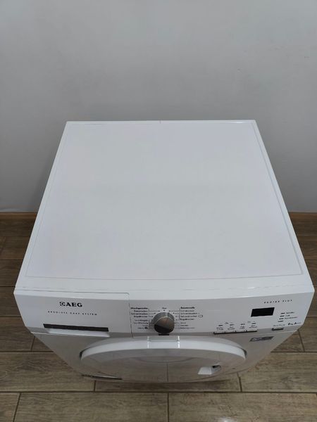 Сушильная машина AEG T6768OIN3 1000W 8кг sn 70828047 000050450 фото