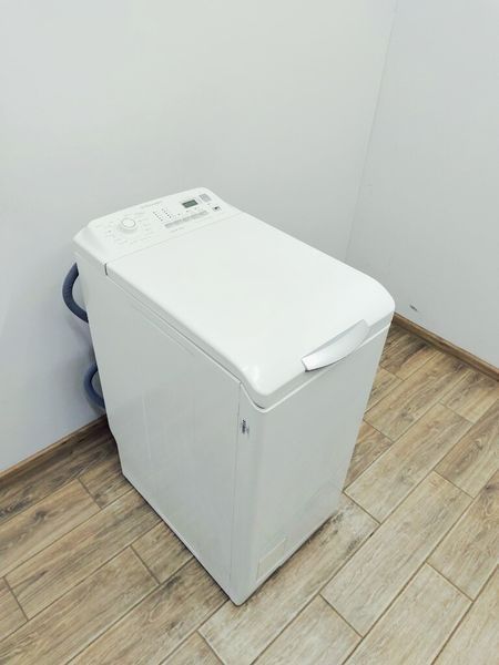 Стиральная машина вертикальная Electrolux EWT12428W 000037926 фото
