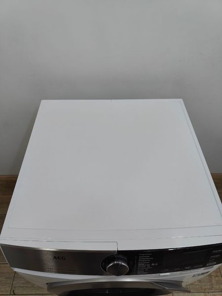 Стиральная машина с сушкой AEG 7000Series Kombi L7WE86605 2200W 6 10 кг sn 84300274 000052357 фото