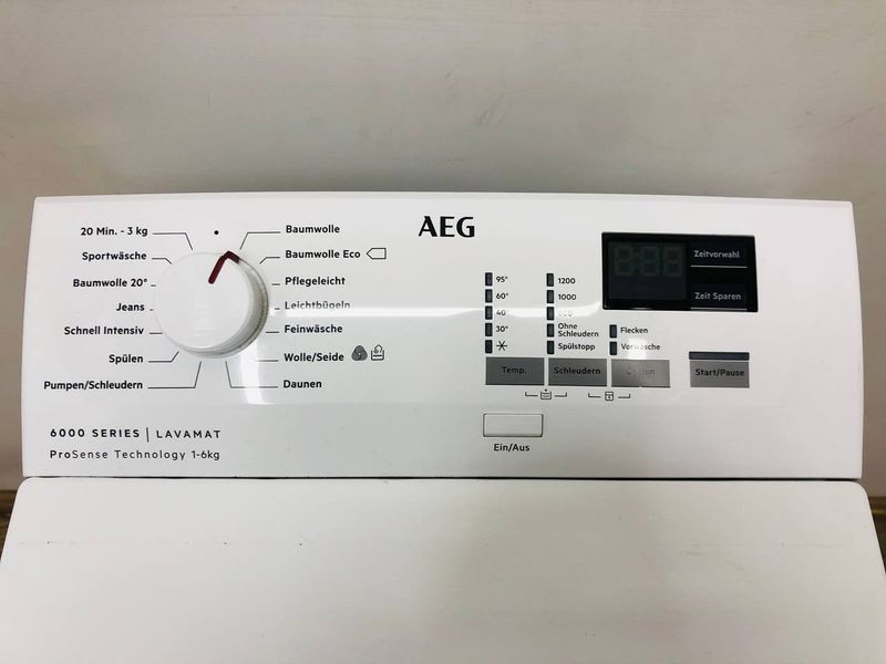 Стиральная машина вертикальная AEG 6000 Series L6TB40260 000042279 фото