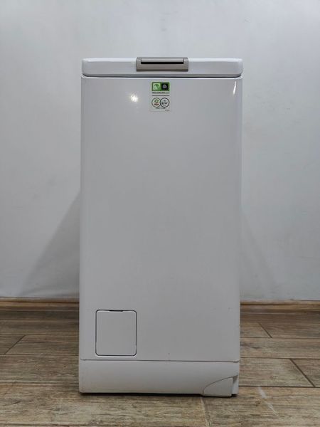 Стиральная машина вертикальная AEG 7000Series Lavamat L7TDN733E 2200W 7кг sn 94700006 000053653 фото