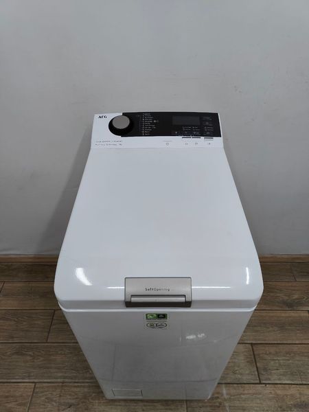 Стиральная машина вертикальная AEG 7000Series Lavamat L7TDN733E 2200W 7кг sn 94700006 000053653 фото