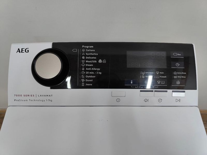 Стиральная машина вертикальная AEG 7000Series Lavamat L7TDN733E 2200W 7кг sn 94700006 000053653 фото