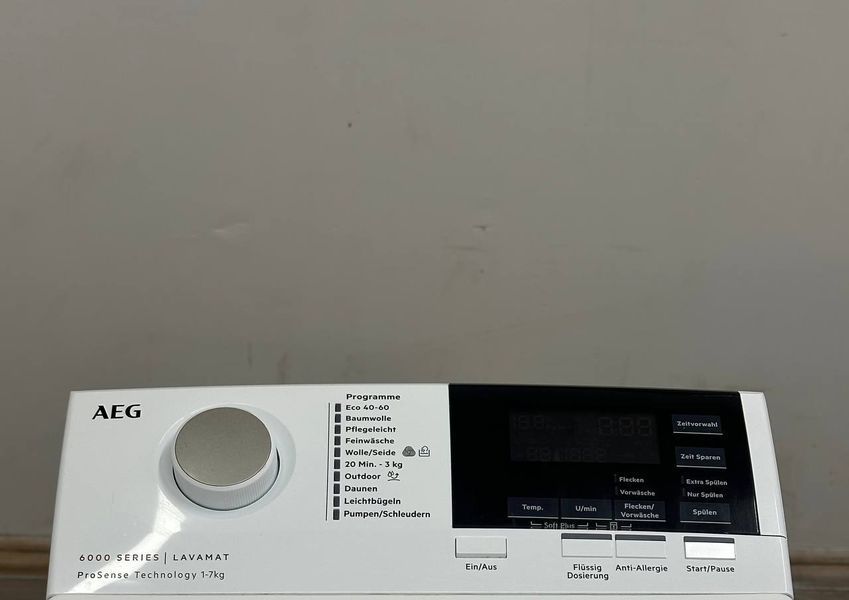 Стиральная машина вертикальная AEG 6000 Series L6TB61370 2200W 7кг sn 11000070 000055154 фото