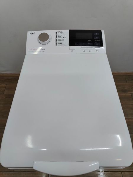 Стиральная машина вертикальная AEG 6000Series Lavamat L6TDN641G 2200W 6кг sn 12000073 000053654 фото
