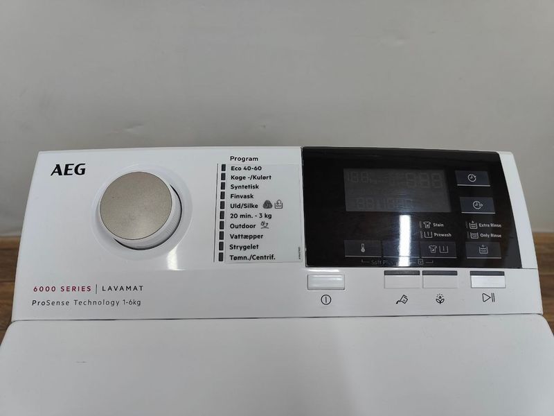 Стиральная машина вертикальная AEG 6000Series Lavamat L6TDN641G 2200W 6кг sn 12000073 000053654 фото