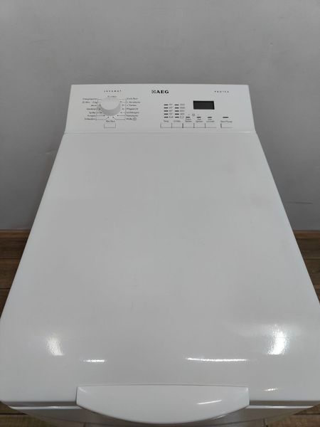 Стиральная машина вертикальная AEG L60260TL 2200W 6кг sn 13900577 000050117 фото