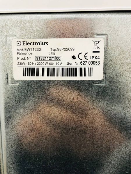 Стиральная машина вертикальная Electrolux EWT1230 000043706 фото