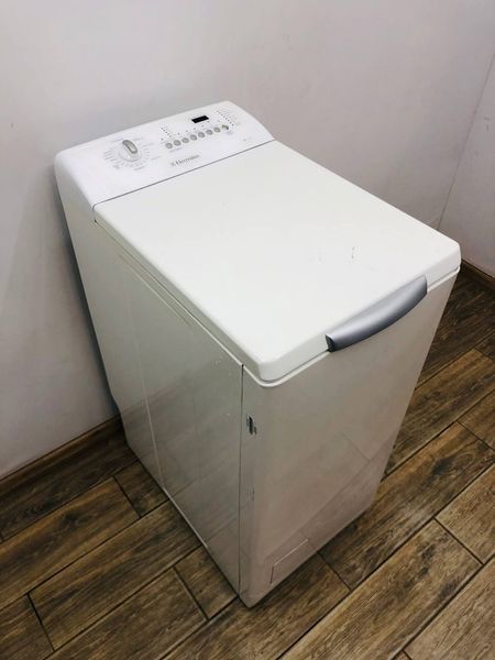 Стиральная машина вертикальная Electrolux EWT1230 000043706 фото