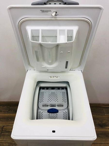 Стиральная машина вертикальная Electrolux EWT1230 000043706 фото