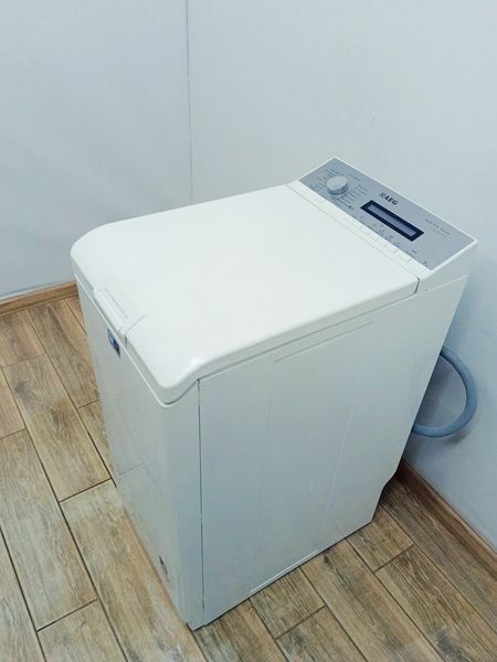 Стиральная машина вертикальная AEG L75275TL 000037080 фото