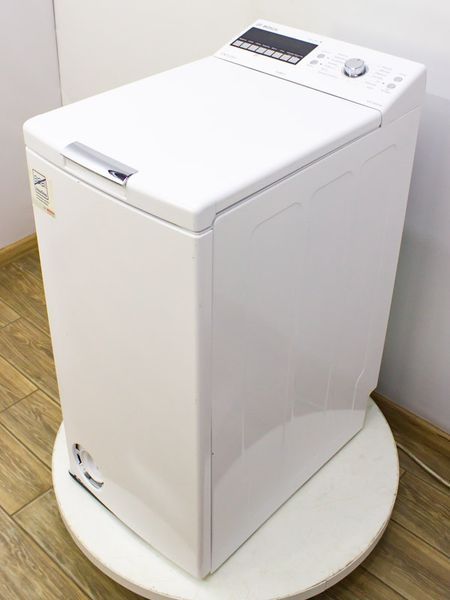 Стиральная машина вертикальная Bosch WOT24495 02 000019304 фото