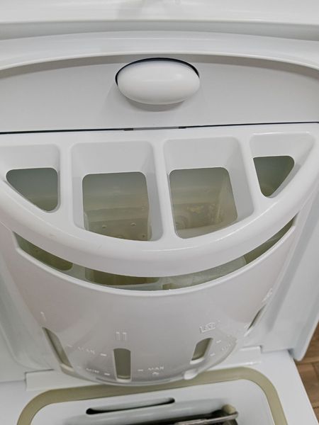 Стиральная машина вертикальная Indesit WITL105 1850W 5кг sn 804029432 000049458 фото