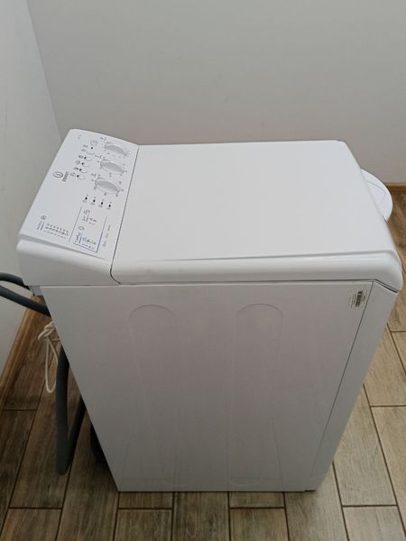Стиральная машина вертикальная Indesit WITL105 1850W 5кг sn 804029432 000049458 фото