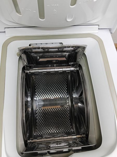 Стиральная машина вертикальная Indesit WITL105 1850W 5кг sn 804029432 000049458 фото