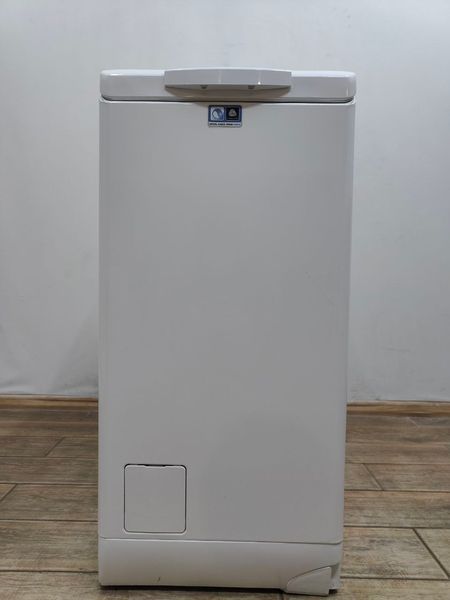 Стиральная машина вертикальная AEG 6000Series Lavamat L6TB40460 2200W 6кг sn 00600476 000053655 фото