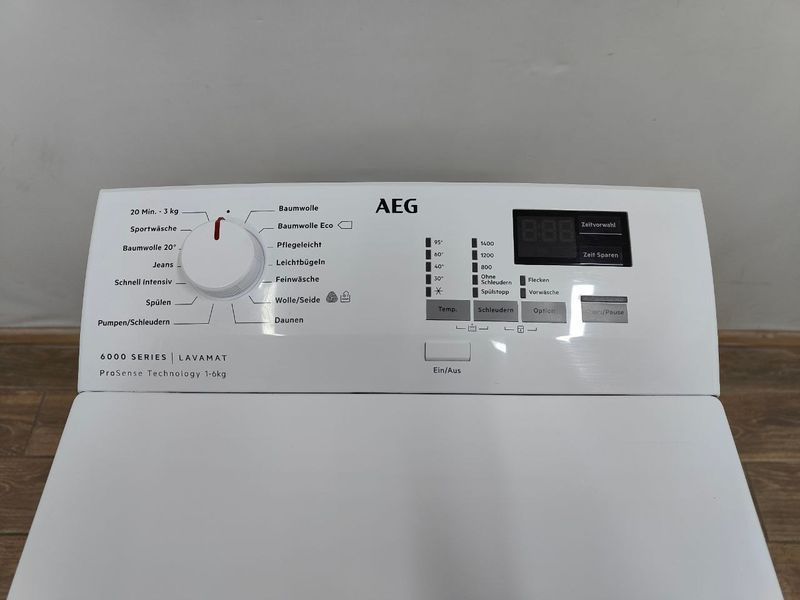 Стиральная машина вертикальная AEG 6000Series Lavamat L6TB40460 2200W 6кг sn 00600476 000053655 фото