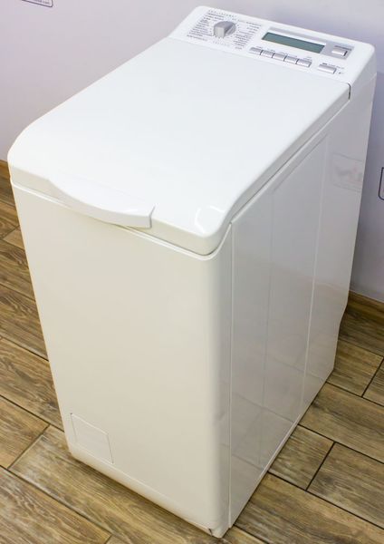 Стиральная машина вертикальная AEG L47239 000016797 фото