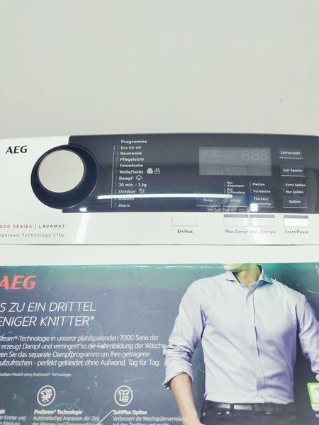 Стиральная машина вертикальная AEG 7000 Series L7TE74275 000045204 фото