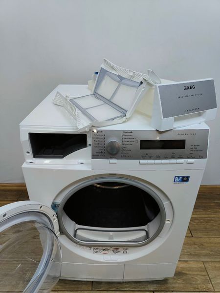 Сушильная машина AEG T76785IH3 900W 8кг sn 50532619 000049588 фото