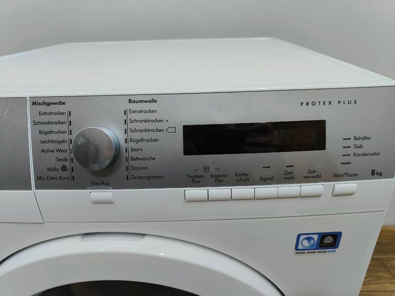 Сушильная машина AEG T76785IH3 900W 8кг sn 50532619 000049588 фото