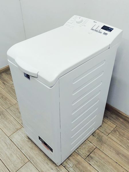Стиральная машина вертикальная AEG 6000 Series L6TB40460 000041799 фото