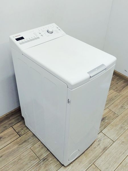 Стиральная машина вертикальная Bosch Serie4 WOT24227 1 000039589 фото