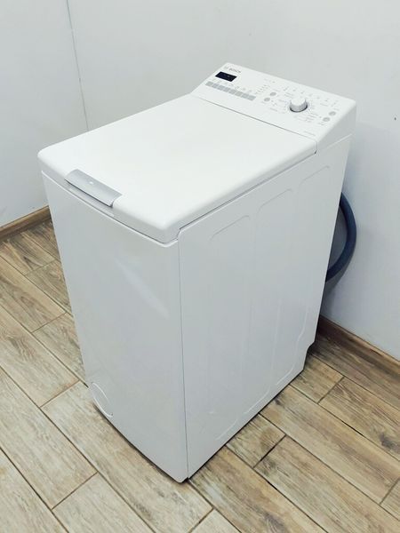 Стиральная машина вертикальная Bosch Serie4 WOT24227 1 000039589 фото