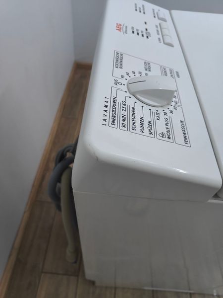 Стиральная машина вертикальная AEG L45000 2300W 5кг sn 04900513 000049836 фото